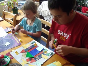 Charli and Daddy O working on Charli's advent castle