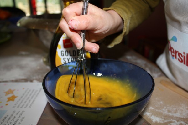 Beat egg and golden syrup Beat egg and golden syrup