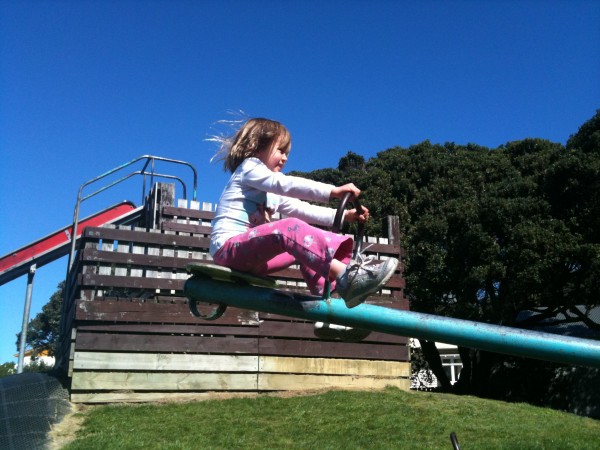 Sophie flying on the sea-saw