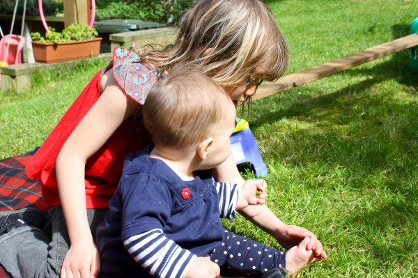 Charlotte with Alice in the garden