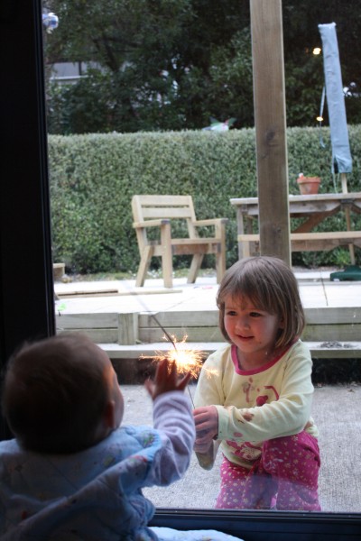 Alice watching her first sparkler