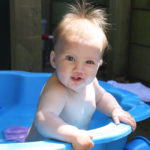 Babble in the paddling pool Alice 8 months