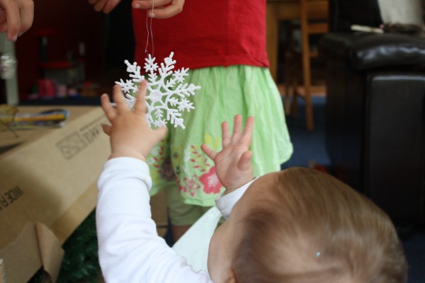 Alice catches her first snow flake!