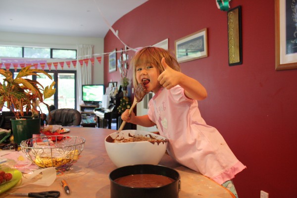 Sophie whipping up a Birthday chocolate cake before 7.30am!