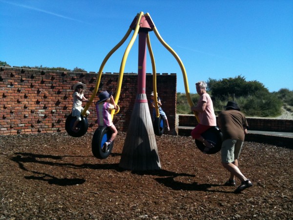 Grandma giving the 'Octopus' ride a whirl!