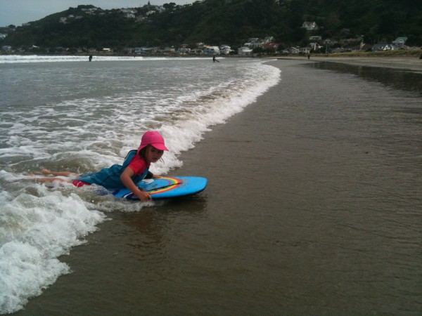 Sophie riding a wave in after school on Friday