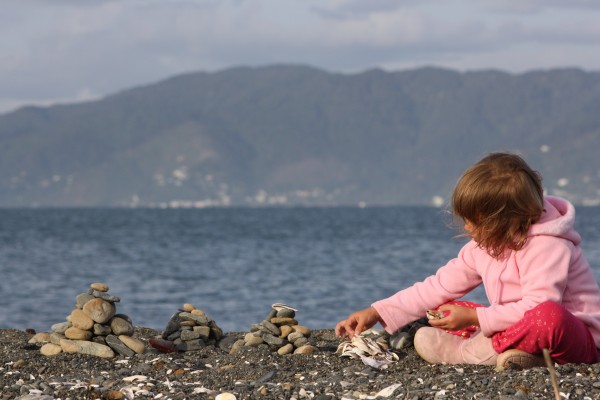 Sophie playing on the beach