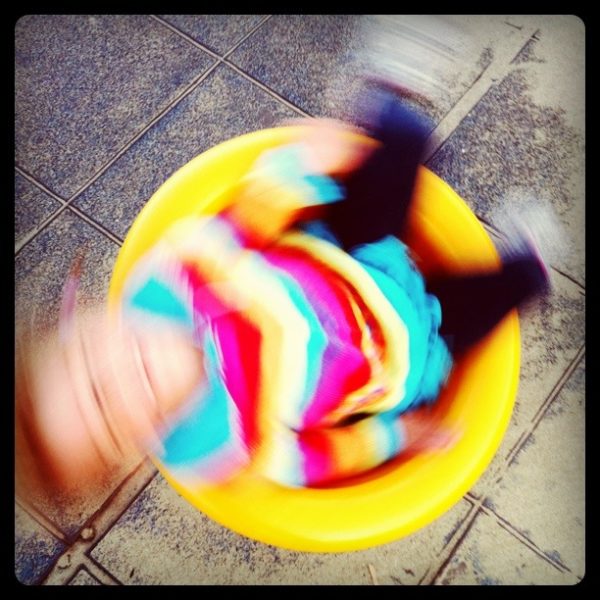 Sophie in the spinner at Lyall Bay playground