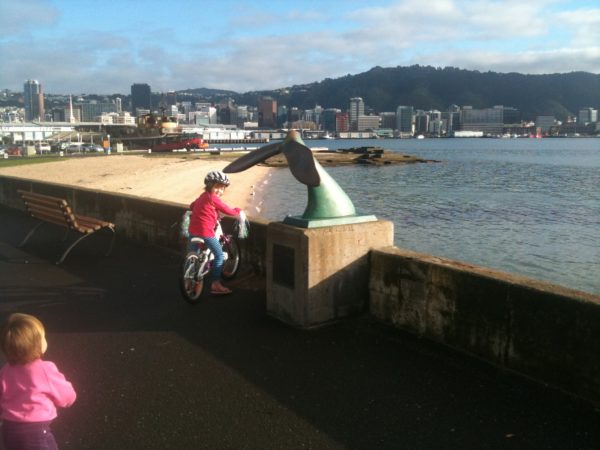 Sophie riding her new bike at Oriental Parade