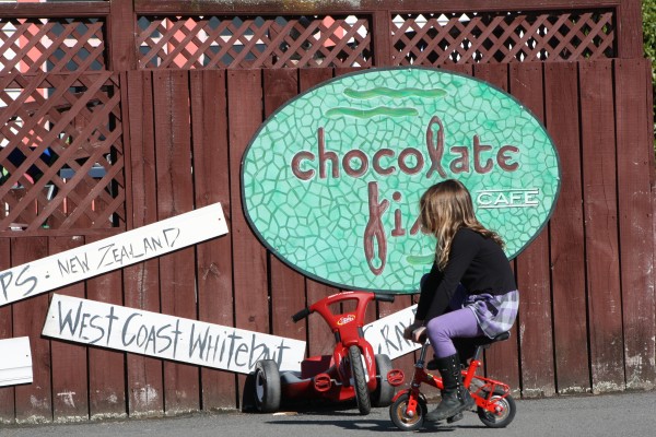 Charlotte riding a mini bike at Chocolate Fish