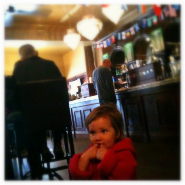 Alice in a Wellington bar enjoying a Sunday roast whilst watching rugby!