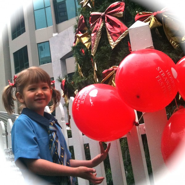 Sophie with red bows in her hair