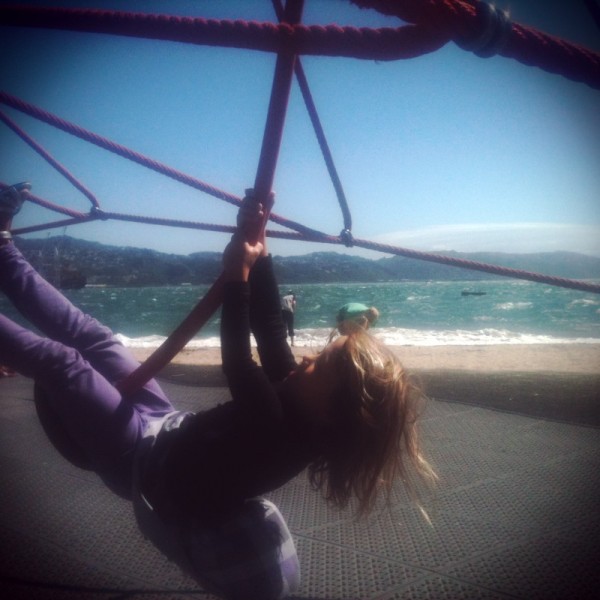 Sophie playing at Oriental Parade playground on a very windy Wellington Sunday!