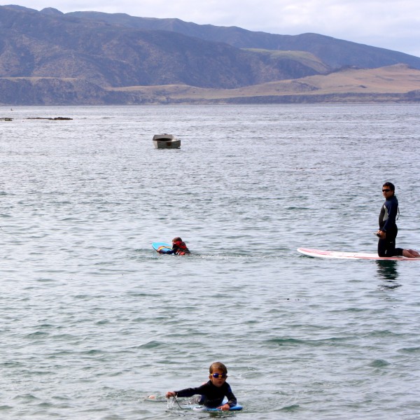 Dan watching over Sophie and Charlotte on their boards.