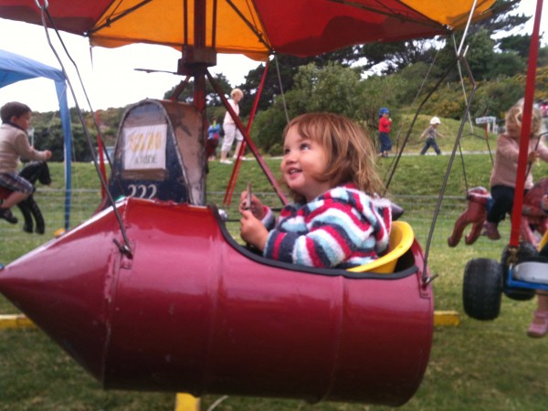 Alice so happy to have a ride on the rocket