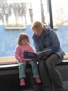 Auntie Claire reading to four year old Charlotte