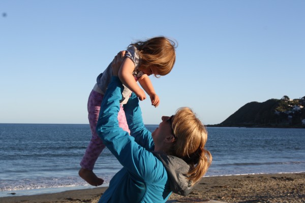 Auntie Claire playing with Alice at Lyall Bay