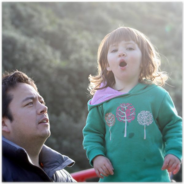 Daddy and youngest daughter - blowing kisses to her Mummy taking a photo :)