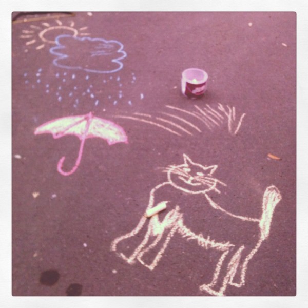 Alice drew 'the wind' by the umbrella and asked me to draw a cat