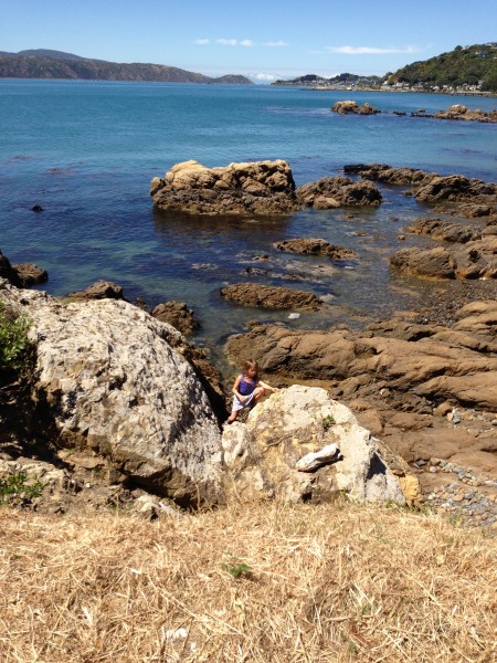 Karaka Bays - Sophie rock climbing - her natural learning P.E.!