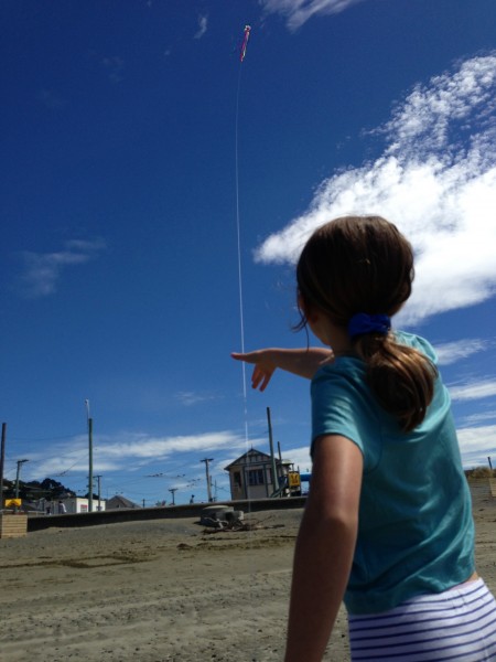 Charlotte flying a kite to the stratosphere