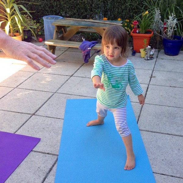 Time for a yoga workout after the long haul... with Miss 2 instructing!