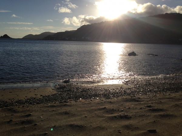 Watching the sun dip down from Princess Bay, Wellington
