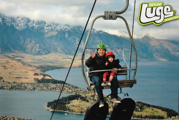 Dan and Alice riding the chair lift to ride the Skyline Luge in Queenstown