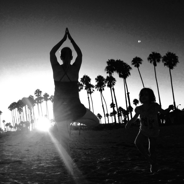 Tree pose salute to the setting sun with my youngest daughter.
