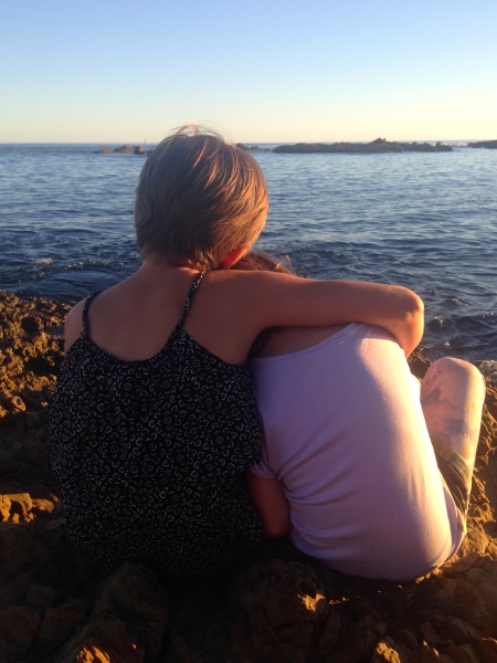 Sophie & Alice at Island Bay, the night before the new school year