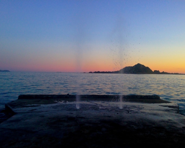 Island Bay sunset and water jets