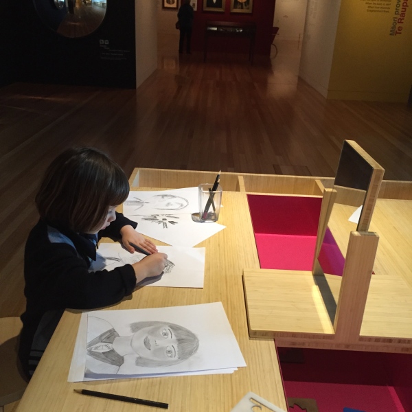 Alice drawing at the museum of Te Papa, Wellington