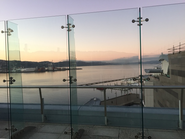 The scene from Level 6 of Te Papa Museum, in Wellington, over looking the harbour at dusk.