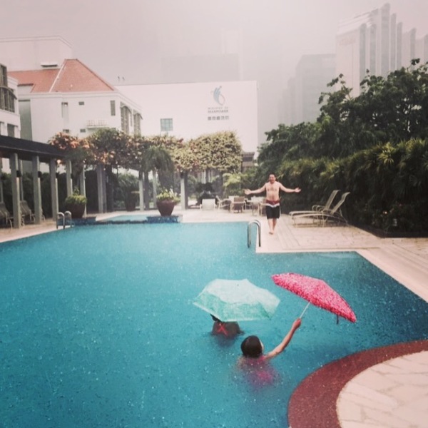 A tropical downpour at the pool! 