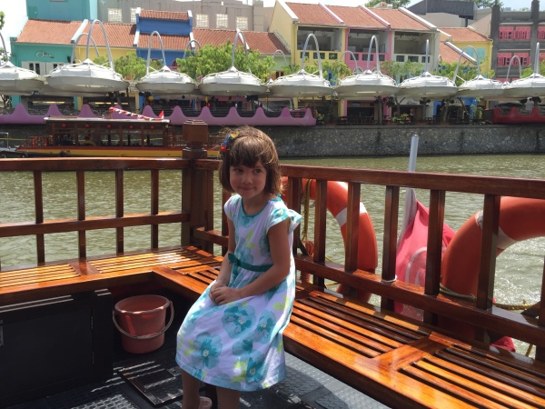 Alice on a 'BumBoat' on the Singapore River