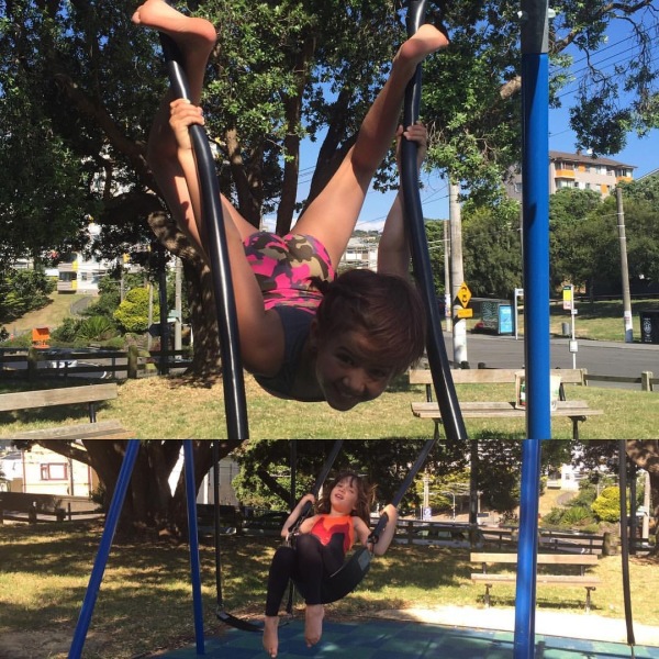 Sophie & Alice hanging out in the sunshine at the playground before their first gymnastics class of the year.