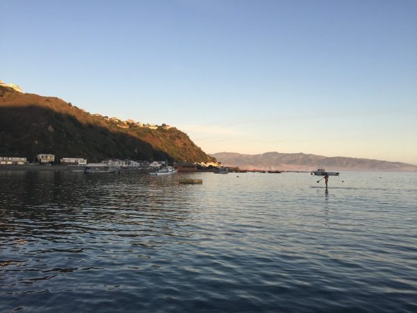 Paddling in as the sunsets over the bay.