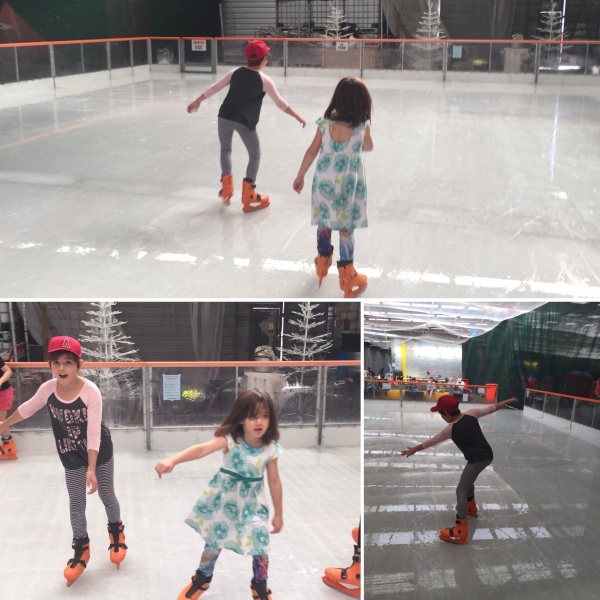Sophie and Alice loving ice-skating in Wellington