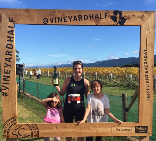 After the half marathon, with my winning bottle of wine and top supporters!