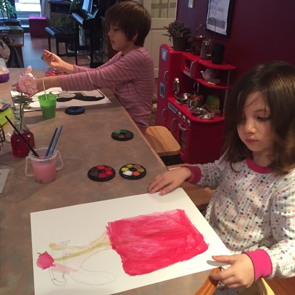 Alice and Sophie enjoying some relaxing time to paint (in their p-jays and barefooted).