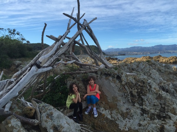 Delighted smiles in finding this driftwood construction on the south coast.