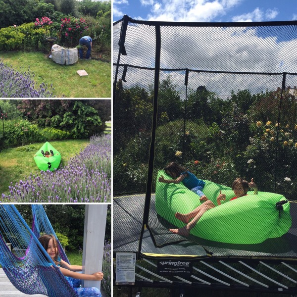 Hacking the weeds in the garden over at Martinborough, whilst the children play in the garden.