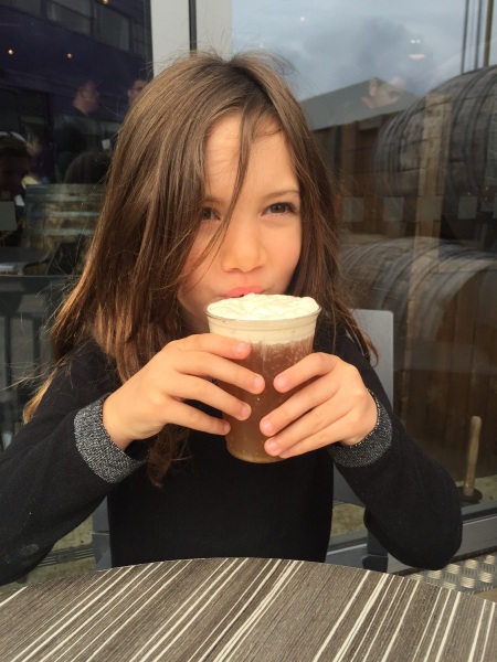 Alice trying a 'Butter Beer'!