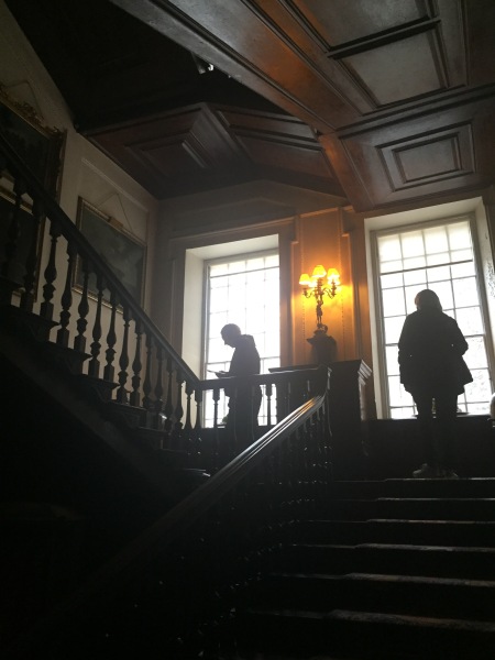 My parents walking up the stair case of Calke Abbey