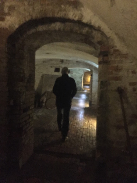 Dad walking ahead of us in the brew house tunnel.