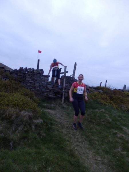 Following my sister over a stile.