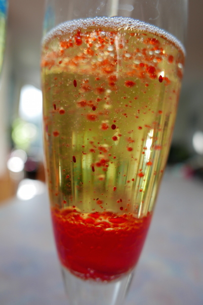 Lava lamp fun with oil, aspirin and red food colouring.
